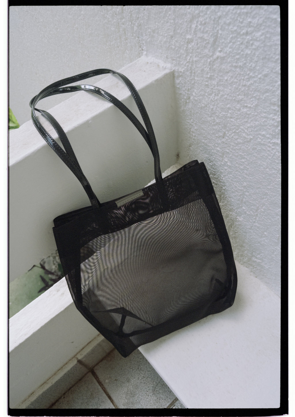Coccinelle mesh black bag