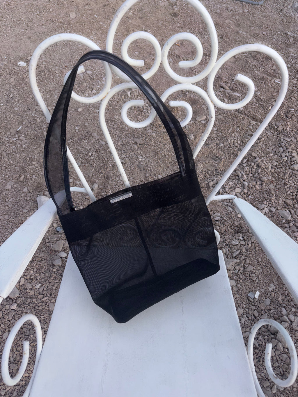 Coccinelle sheer black bag