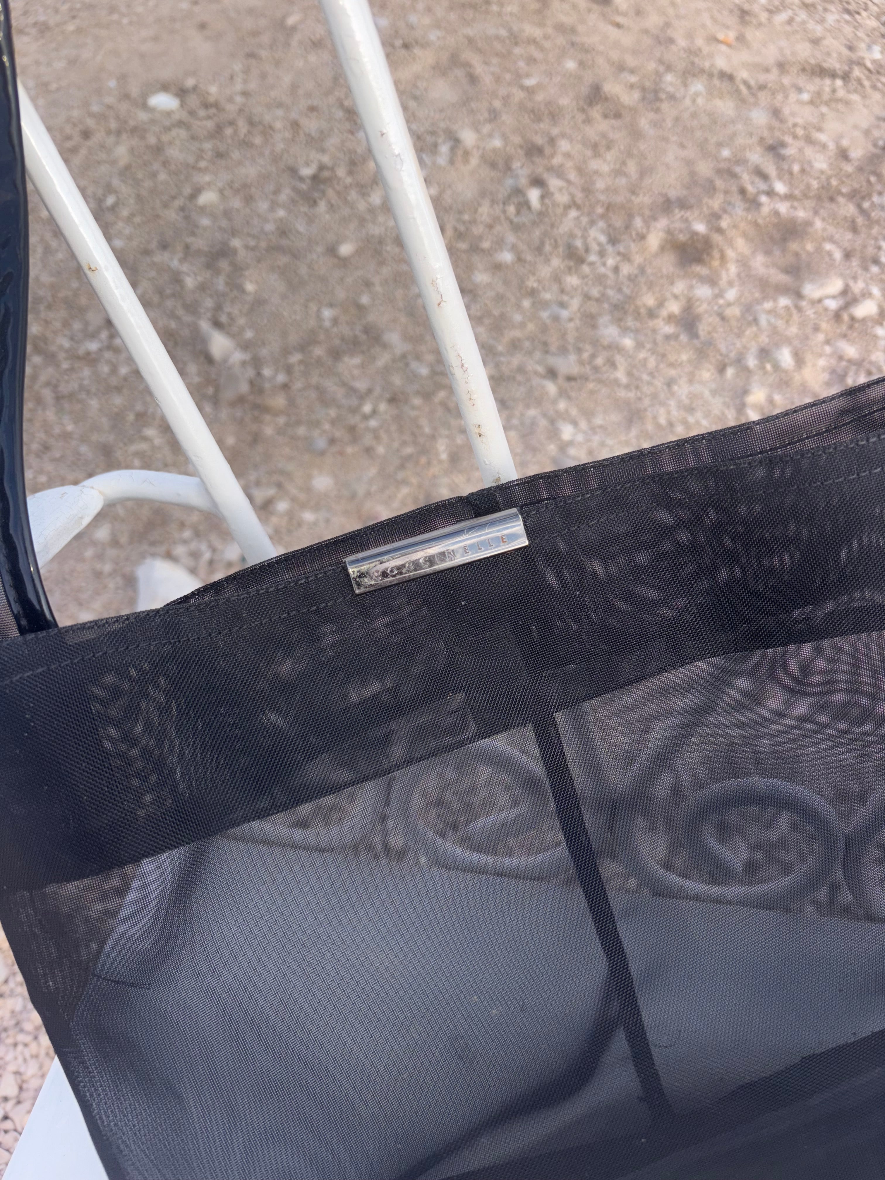 Coccinelle sheer black bag