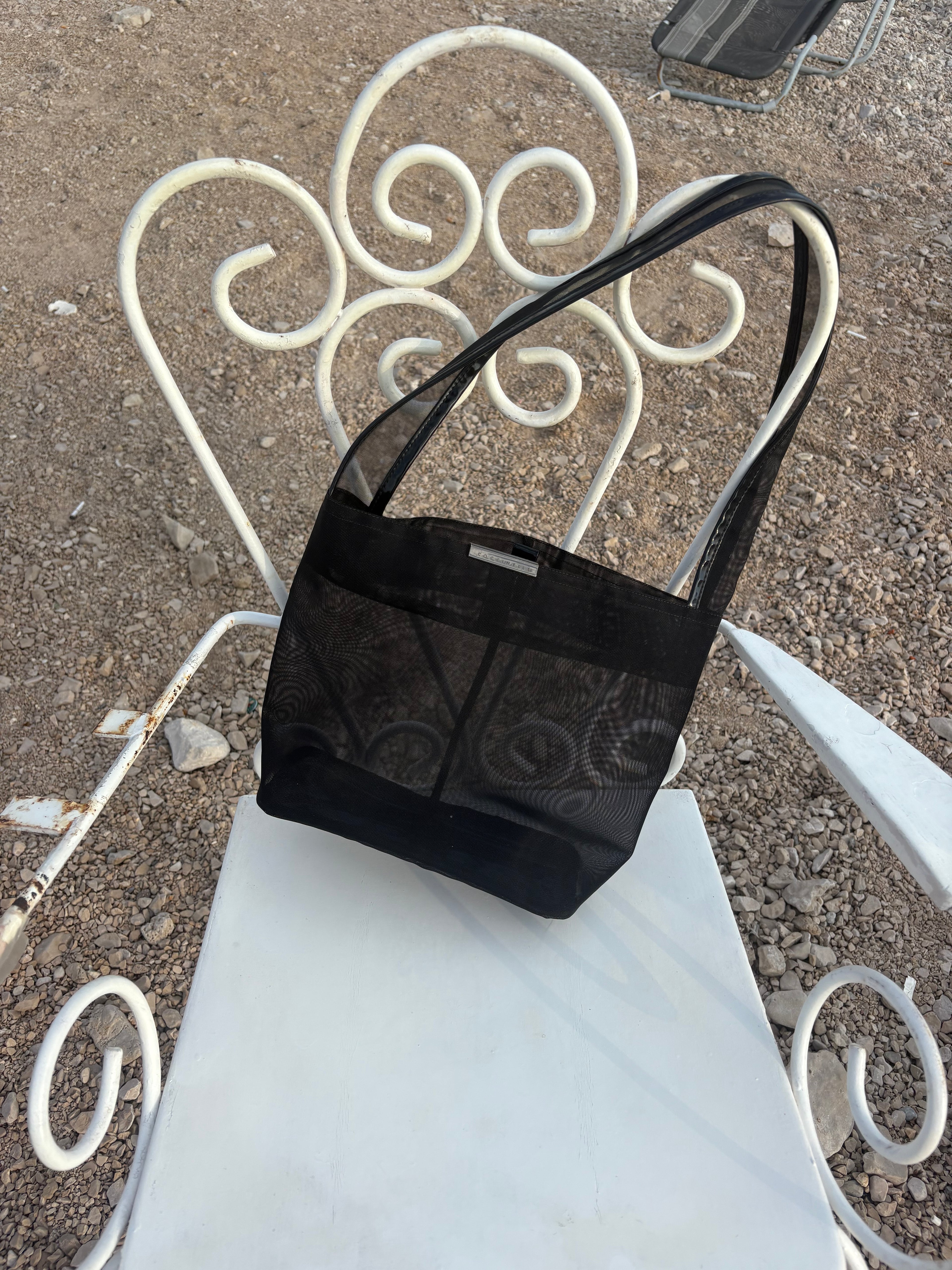 Coccinelle sheer black bag