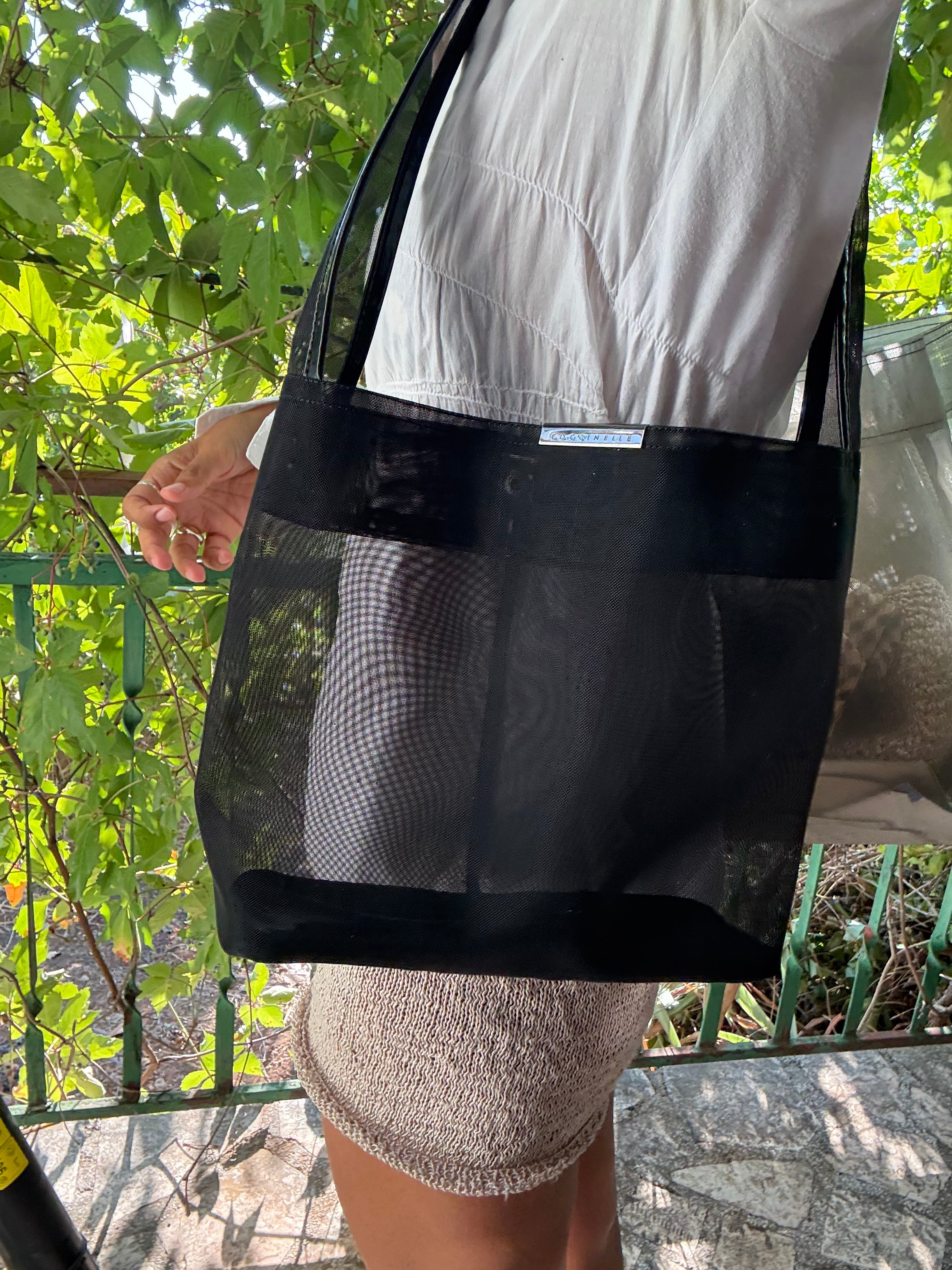 Coccinelle sheer black bag