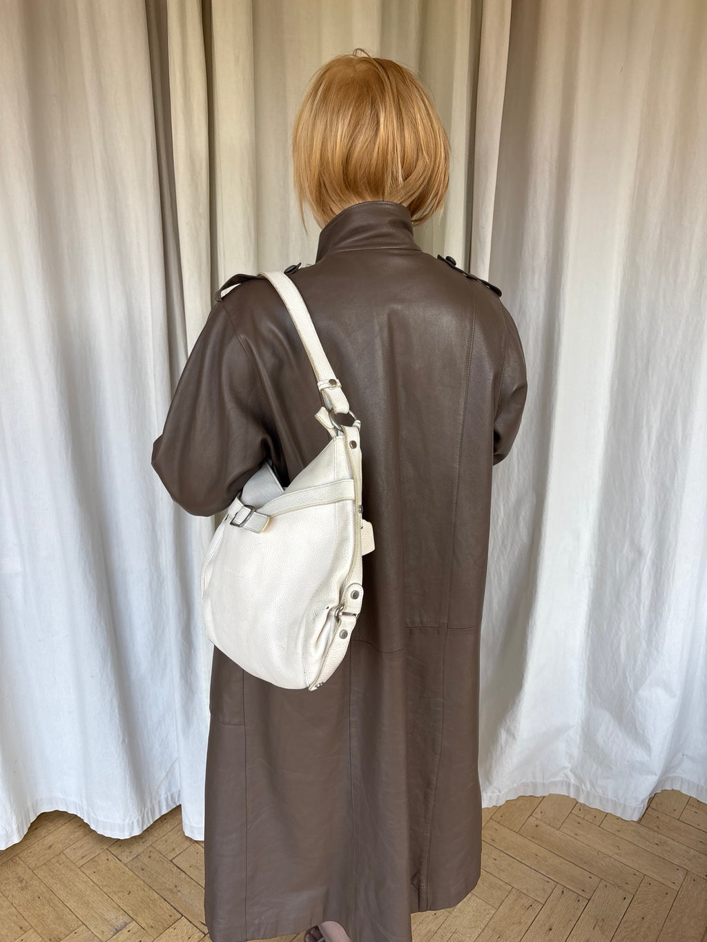 White leather buckle bag