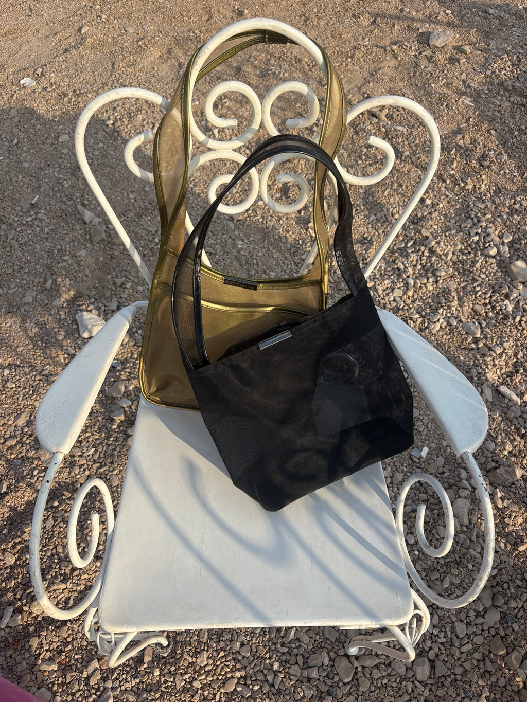 Coccinelle sheer black bag